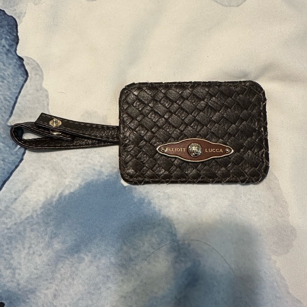 Elliot Lucca luggage tag
